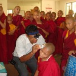 Checking ears at Shechen ear camp