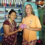 Indira, founder of PA Nepal program receives a donation from Whitsunday Lions club, via lew