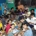 Kids from PA Nepal receive books courtesy of Whitsunday Shire Libraries.